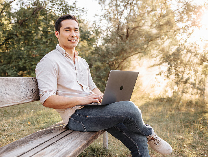 Nature view with work on laptop